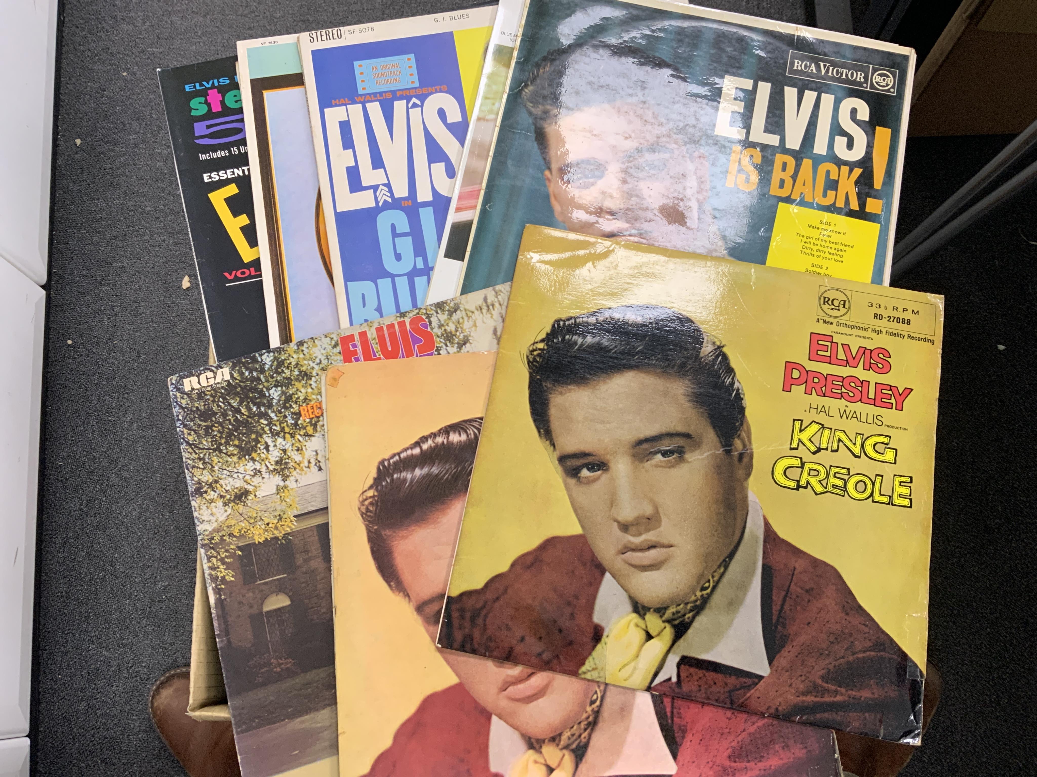 Sixty-two Elvis Presley and Eddie Cochran LP record albums, including forty-six Elvis Presley albums and compilations, together with sixteen Eddie Cochran albums, including duplicates of several albums. Condition - fair